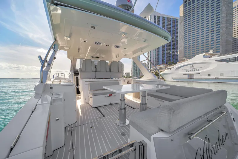 Yacht Photos Pics 2020 Azimut Verve 40 yacht with sleek deck and modern seating, docked in a marina.