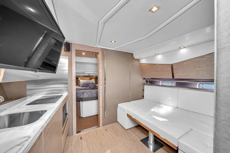  Yacht Photos Pics Luxurious interior of 2020 Azimut Verve 40 yacht with modern kitchen and seating area.