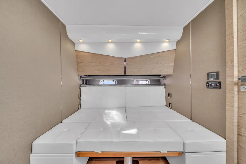  Yacht Photos Pics Luxurious interior of 2020 Azimut Verve 40 yacht with modern white seating.