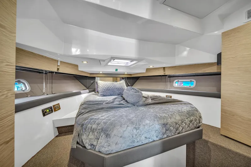  Yacht Photos Pics Luxurious cabin interior of 2020 Azimut Verve 40 yacht with cozy bedding.