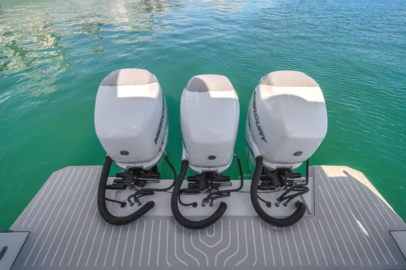  Yacht Photos Pics Azimut Verve 40 2020 with triple outboard engines on turquoise water.