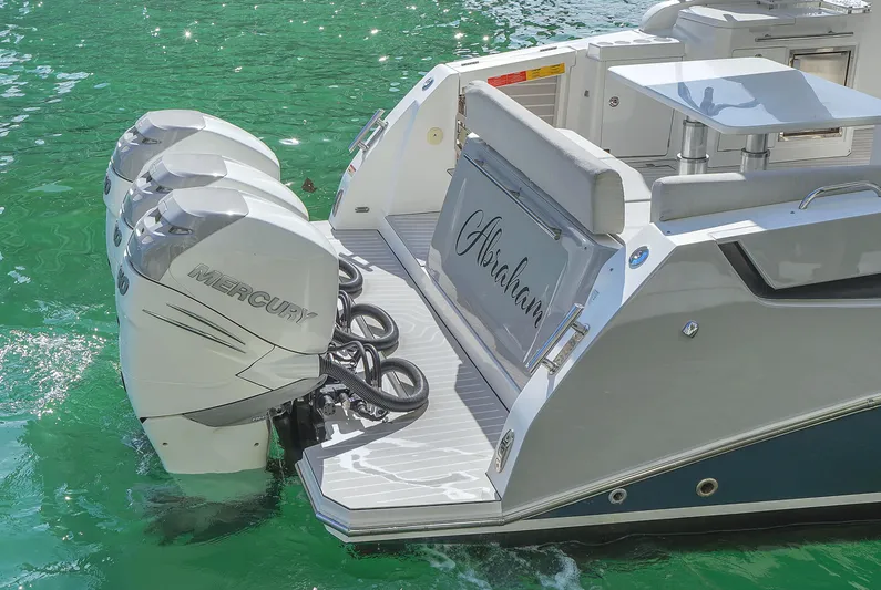  Yacht Photos Pics Azimut Verve 40 yacht, 2020 model, with powerful Mercury outboard engines on turquoise water.