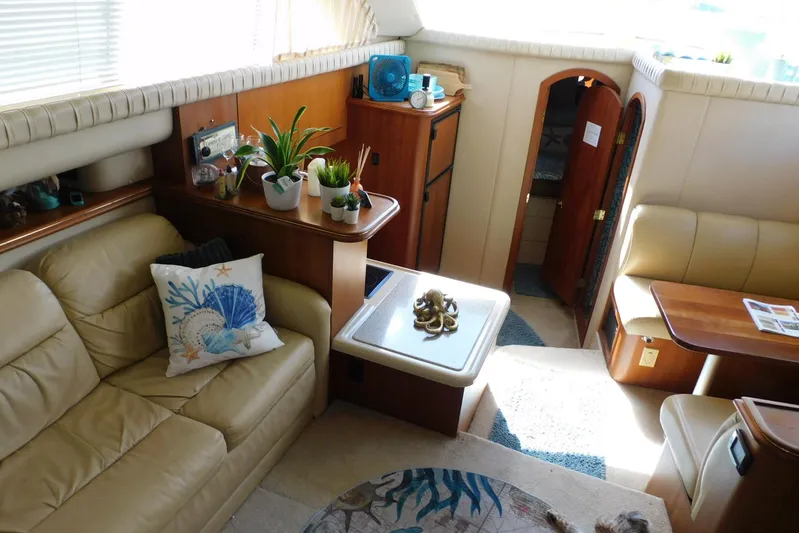 How Lucky Yacht Photos Pics Luxurious interior of 2003 Cruisers Yachts 3750 Motoryacht with elegant seating and decor.