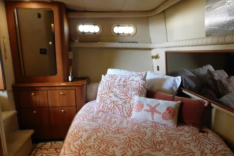 How Lucky Yacht Photos Pics Luxurious 2003 Cruisers Yachts 3750 Motoryacht bedroom with elegant decor and cozy bedding.
