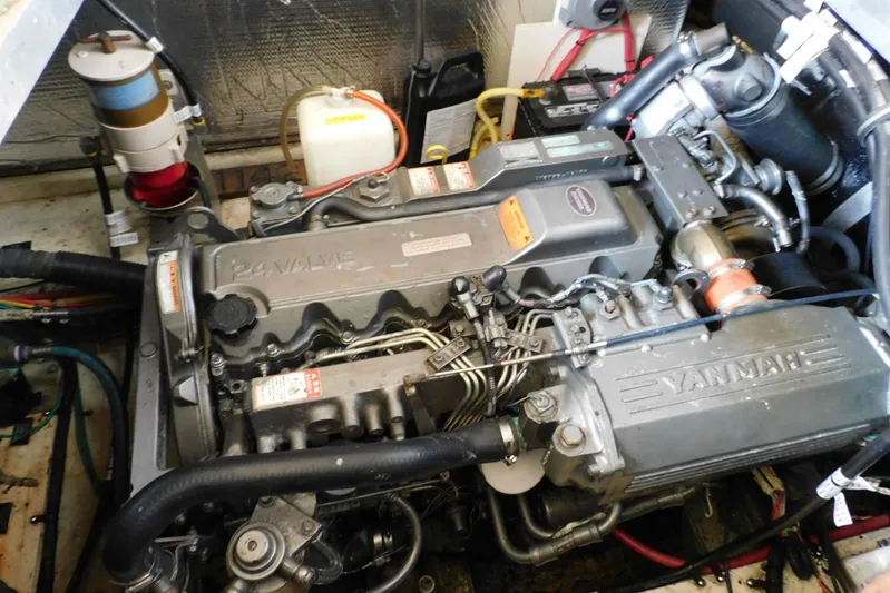 How Lucky Yacht Photos Pics Engine compartment of 2003 Cruisers Yachts 3750 Motoryacht with Yanmar diesel engine.