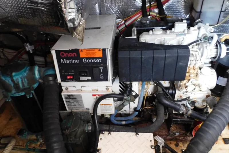 How Lucky Yacht Photos Pics Engine room of 2003 Cruisers Yachts 3750 Motoryacht with Onan Marine Genset.