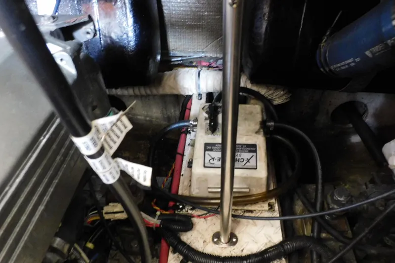 How Lucky Yacht Photos Pics Engine compartment of 2003 Cruisers Yachts 3750 Motoryacht, showing wiring and components.