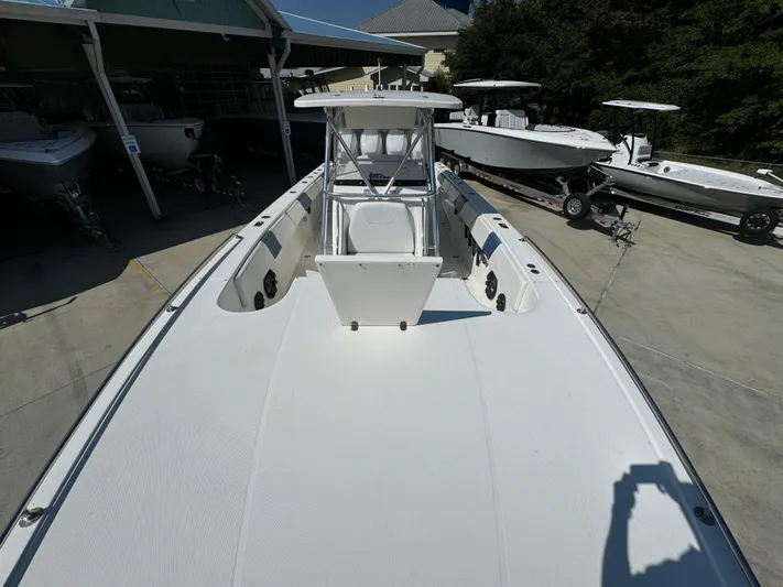  Yacht Photos Pics 2009 Fountain 38 CC Tournament Edition boat, white deck, parked outdoors.