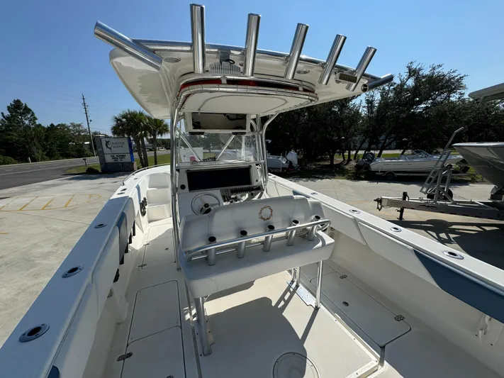  Yacht Photos Pics 2009 Fountain 38 CC Tournament Edition boat, center console view, docked outdoors.