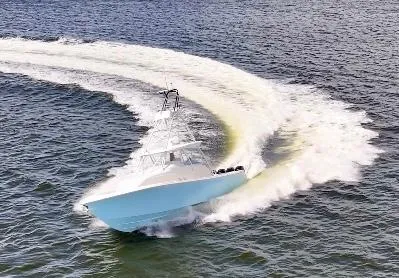 Saltwater Striker Yacht Photos Pics 2016 SeaVee 430 Fish Around boat making a sharp turn on open water.