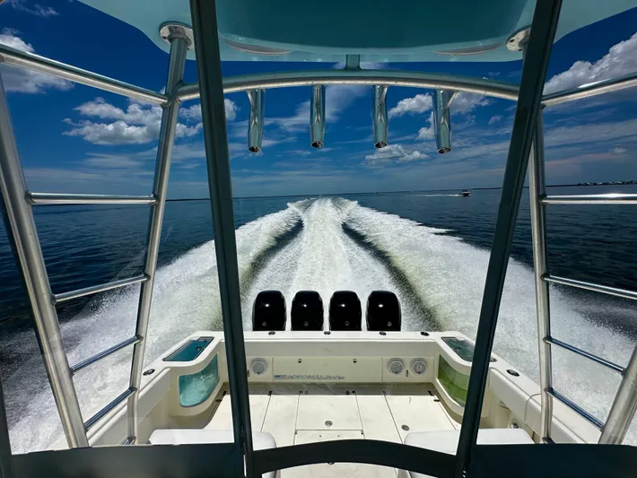 Saltwater Striker Yacht Photos Pics 2016 SeaVee 430 Fish Around boat cruising on open water, leaving a wake behind.