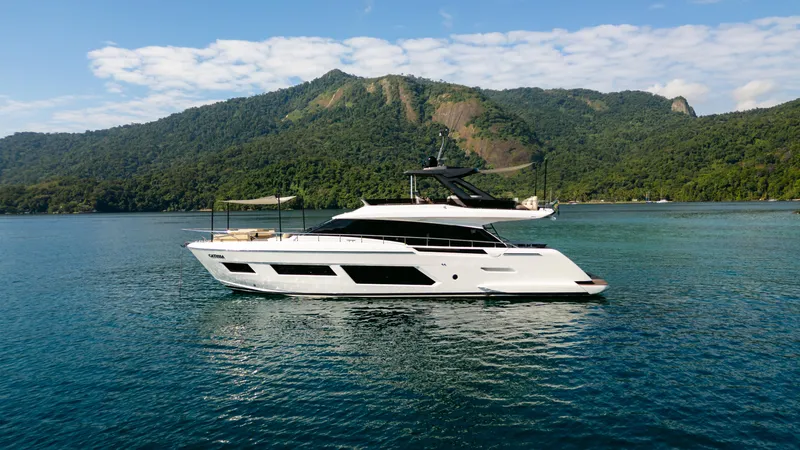 Catissa Yacht Photos Pics Luxurious 2024 Ferretti Yachts 670 cruising in scenic coastal waters.