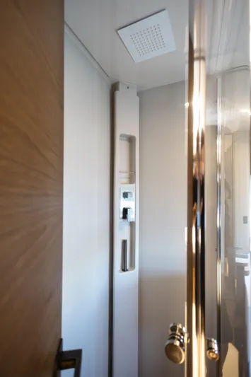 Catissa Yacht Photos Pics Modern shower interior on 2024 Ferretti Yachts 670, featuring sleek design and chrome fixtures.