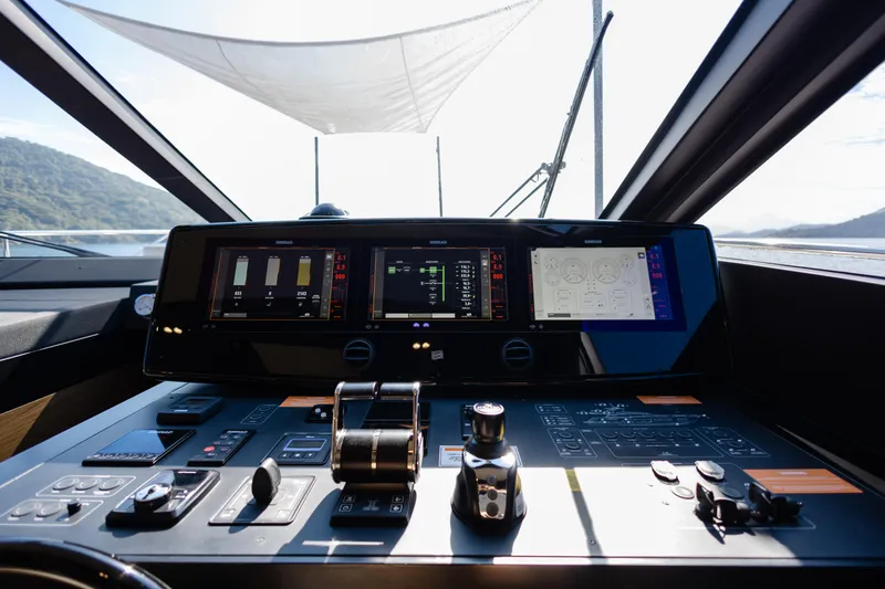 Catissa Yacht Photos Pics Control panel of 2024 Ferretti Yachts 670, featuring advanced navigation displays and controls.