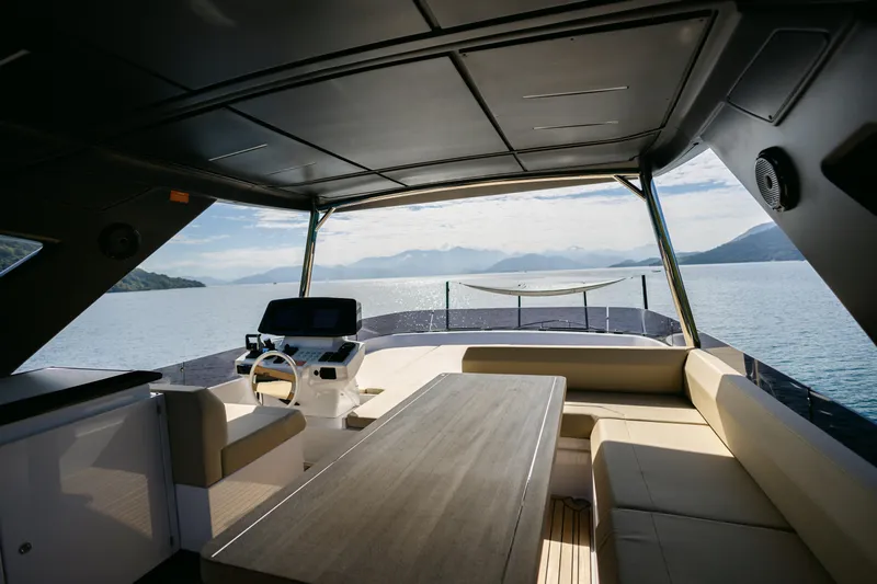 Catissa Yacht Photos Pics Luxurious 2024 Ferretti Yachts 670 interior with scenic ocean view.