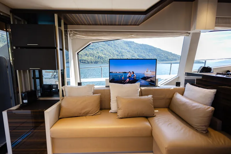 Catissa Yacht Photos Pics Luxurious interior of 2024 Ferretti Yachts 670 with scenic water view.