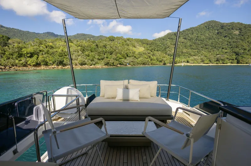Catissa Yacht Photos Pics Luxurious deck of 2024 Ferretti Yachts 670 with scenic ocean view and comfortable seating.