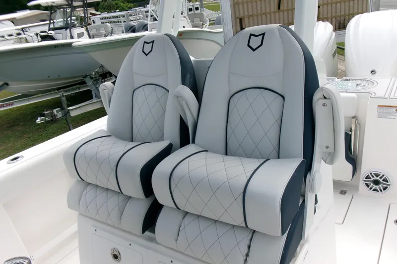 Black Label Marine Yacht Photos Pics 2026 Sea Fox 288 Commander boat seats with diamond stitching and armrests.
