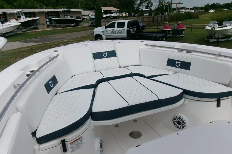 Black Label Marine Yacht Photos Pics 2026 Sea Fox 288 Commander boat with spacious, cushioned seating area.