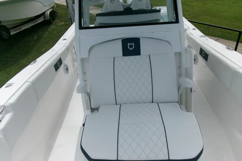 Black Label Marine Yacht Photos Pics 2026 Sea Fox 288 Commander boat interior with white cushioned seating and sleek design.