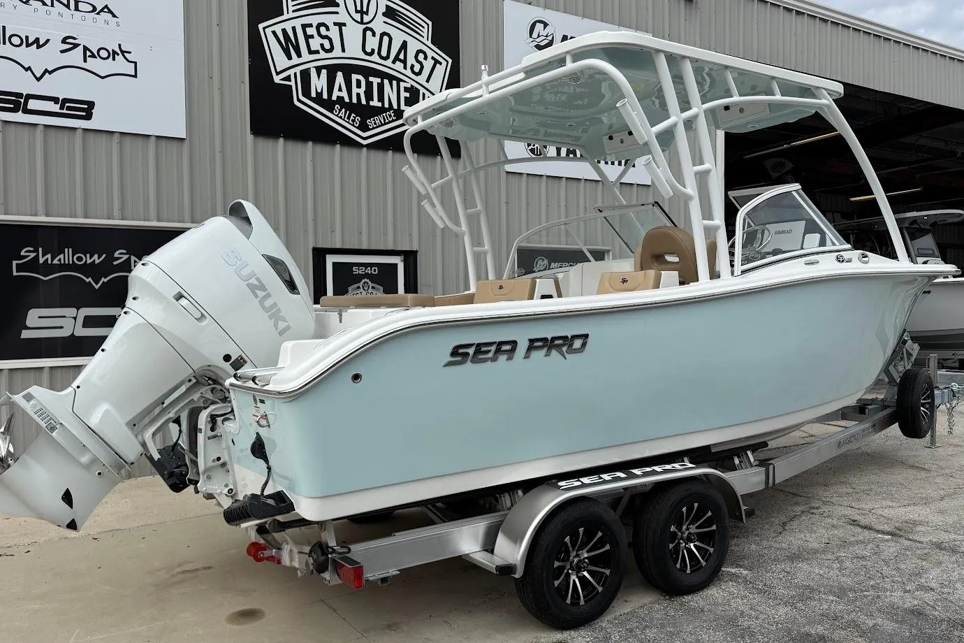 2026 Sea Pro 240 Dual Console boat with Suzuki engine at West Coast Marine.