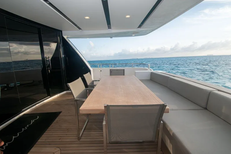 Muma Yacht Photos Pics Outdoor dining area on 2016 Sanlorenzo SL96 yacht with ocean view.