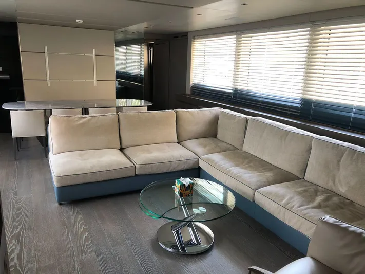 Muma Yacht Photos Pics Luxurious interior of 2016 Sanlorenzo SL96 yacht with modern sofa and glass table.