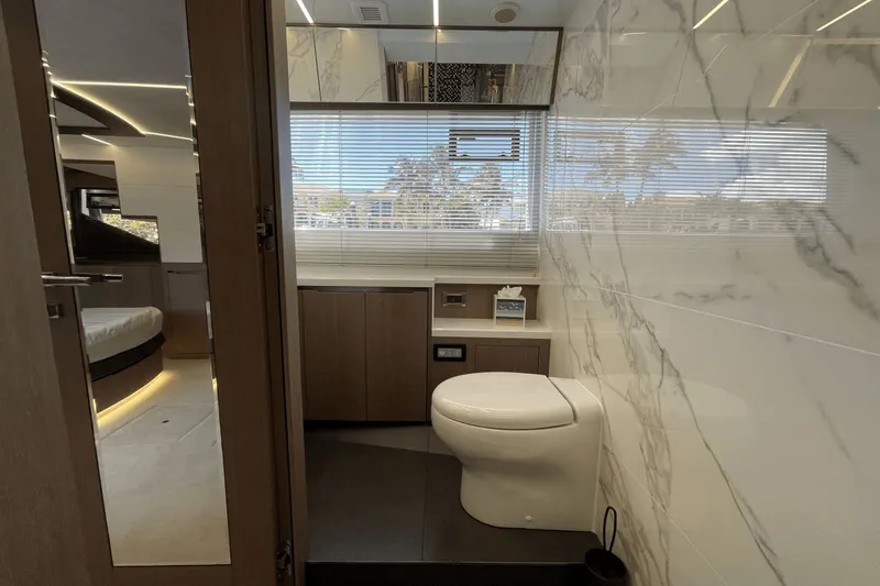  Yacht Photos Pics Luxurious bathroom interior on 2021 Galeon 640 FLY BRIDGE yacht with modern design.