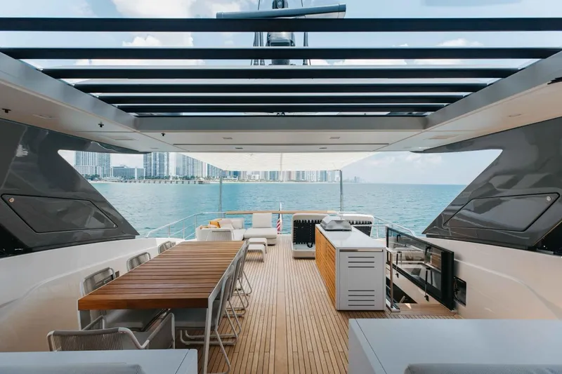 Chameleon Yacht Photos Pics Luxurious 2024 Sanlorenzo SL90A yacht deck with ocean view and modern amenities.