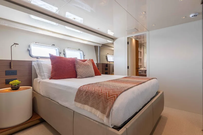 Chameleon Yacht Photos Pics Luxurious bedroom interior of 2024 Sanlorenzo SL90A yacht with modern decor and natural light.