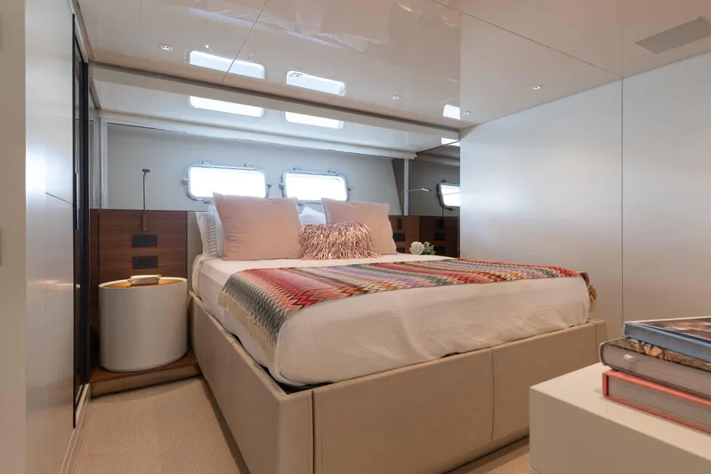 Chameleon Yacht Photos Pics Luxurious bedroom interior of 2024 Sanlorenzo SL90A yacht with modern decor and natural light.