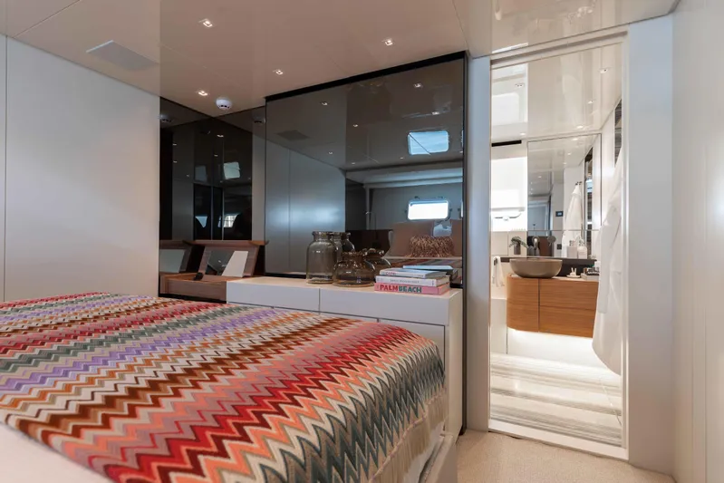 Chameleon Yacht Photos Pics Luxurious interior of 2024 Sanlorenzo SL90A yacht with modern bedroom and ensuite bathroom.