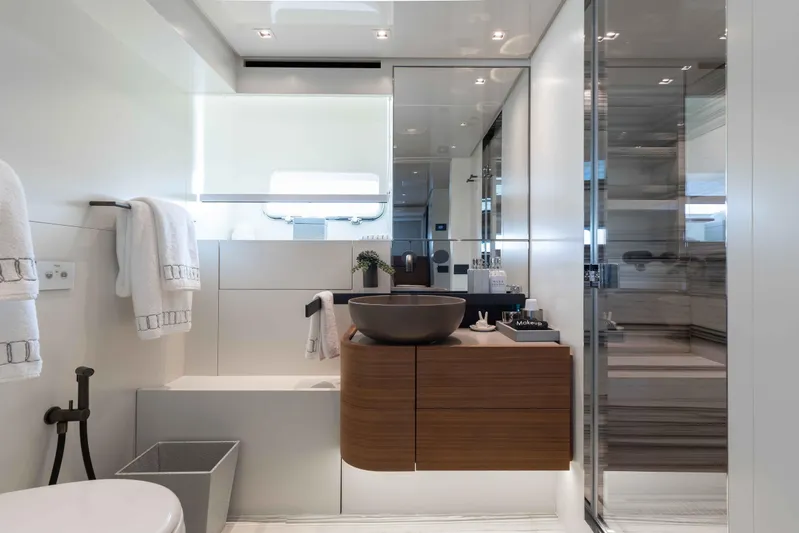 Chameleon Yacht Photos Pics Luxurious bathroom in 2024 Sanlorenzo SL90A yacht with modern fixtures and elegant design.