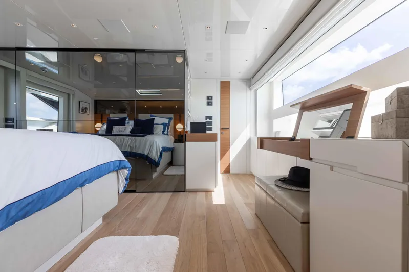 Chameleon Yacht Photos Pics Luxurious interior of 2024 Sanlorenzo SL90A yacht with modern bedroom design.