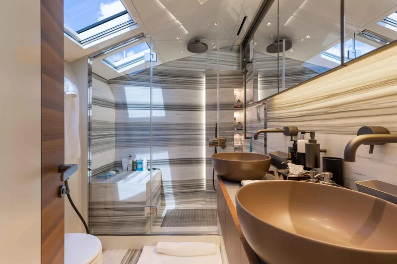 Chameleon Yacht Photos Pics Luxurious bathroom on 2024 Sanlorenzo SL90A yacht with modern fixtures and elegant design.