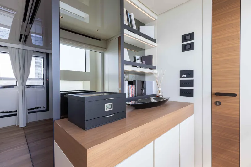 Chameleon Yacht Photos Pics Luxurious interior of 2024 Sanlorenzo SL90A yacht with modern decor and wooden accents.