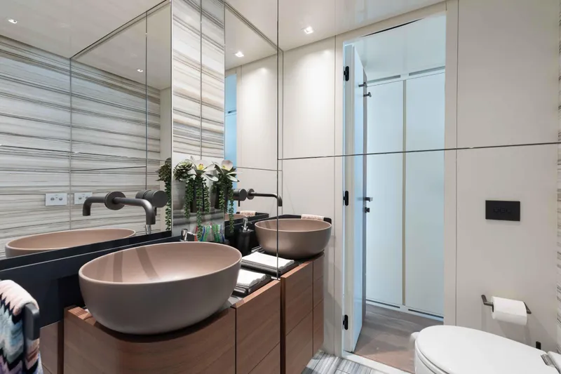 Chameleon Yacht Photos Pics Luxurious bathroom on 2024 Sanlorenzo SL90A yacht with modern fixtures and elegant design.