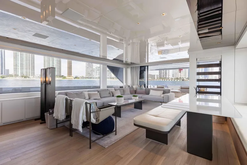 Chameleon Yacht Photos Pics Luxurious interior of 2024 Sanlorenzo SL90A yacht with modern furnishings and waterfront view.