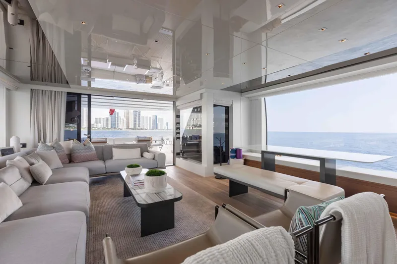 Chameleon Yacht Photos Pics Luxurious interior of 2024 Sanlorenzo SL90A yacht with ocean view and modern furnishings.