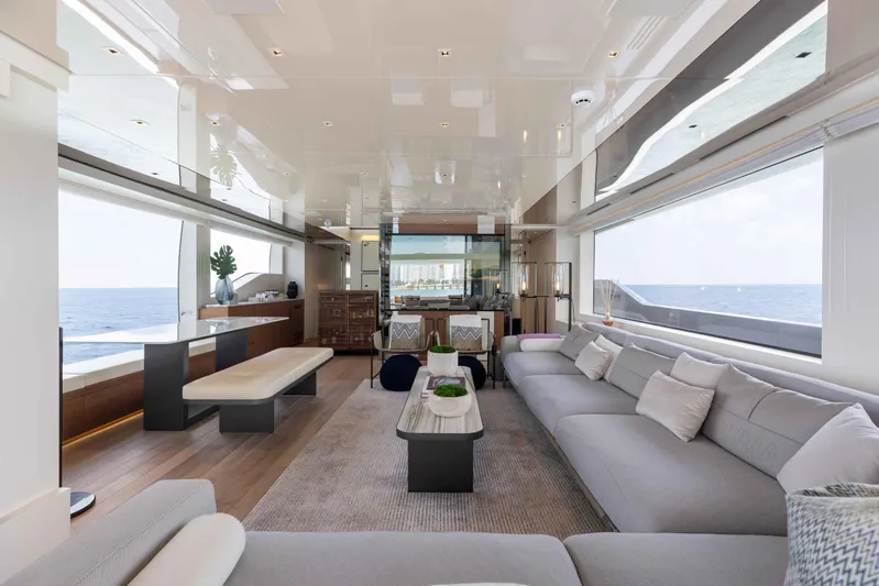 Chameleon Yacht Photos Pics Luxurious interior of 2024 Sanlorenzo SL90A yacht with ocean view and modern furnishings.