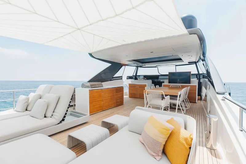 Chameleon Yacht Photos Pics Luxurious 2024 Sanlorenzo SL90A yacht deck with modern seating and ocean view.