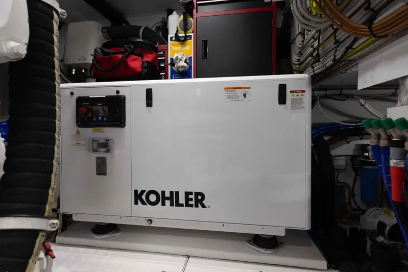 Chameleon Yacht Photos Pics Engine room of 2024 Sanlorenzo SL90A yacht featuring a Kohler generator.