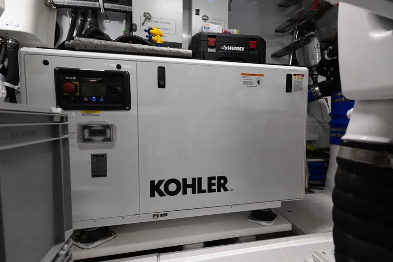 Chameleon Yacht Photos Pics Engine room of 2024 Sanlorenzo SL90A yacht featuring Kohler generator.