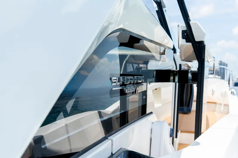  Yacht Photos Pics 2024 Sunseeker Superhawk 55 yacht, sleek design with reflective windows and modern detailing.