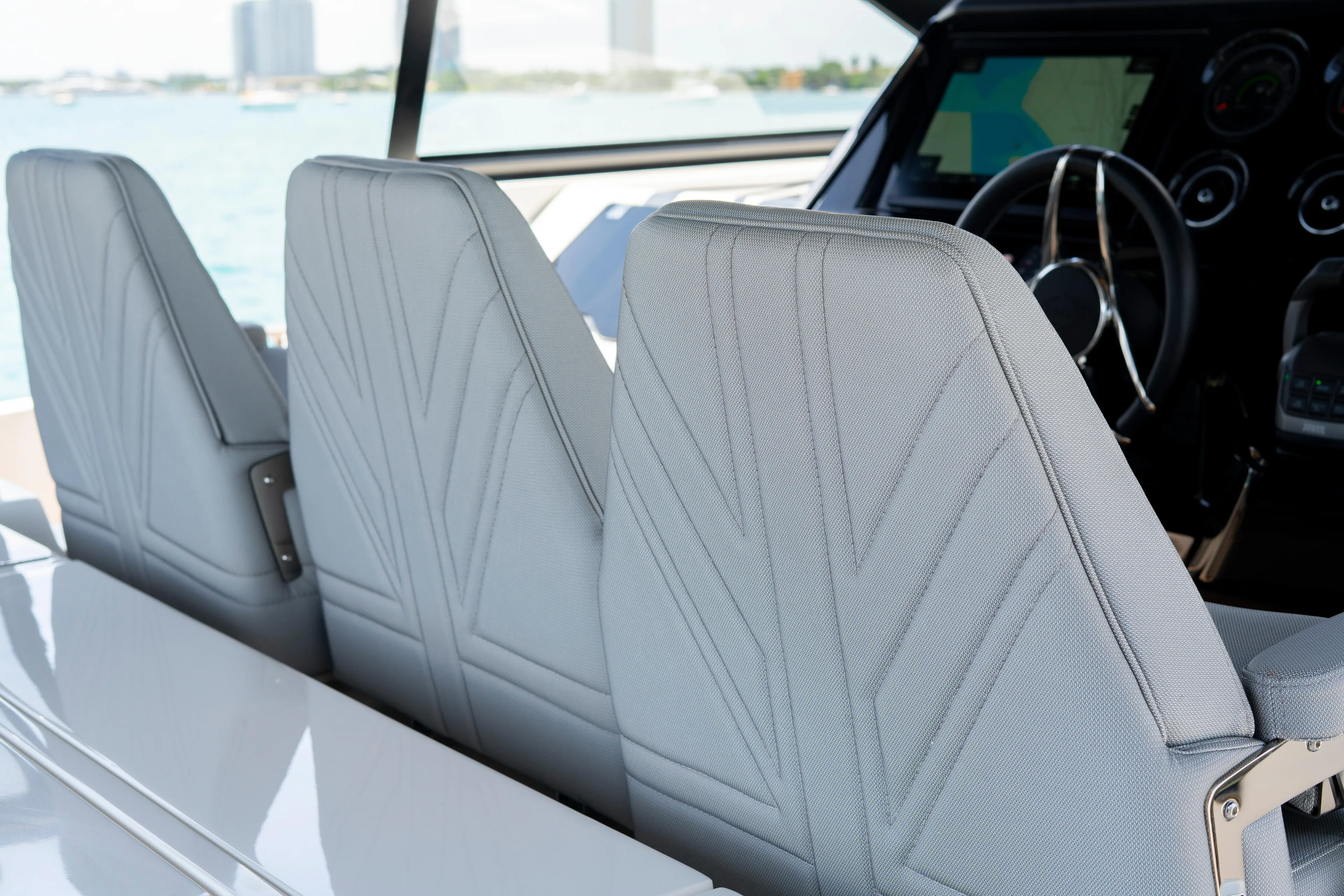  Yacht Photos Pics 2024 Sunseeker Superhawk 55 helm seats with modern design and luxurious detailing.