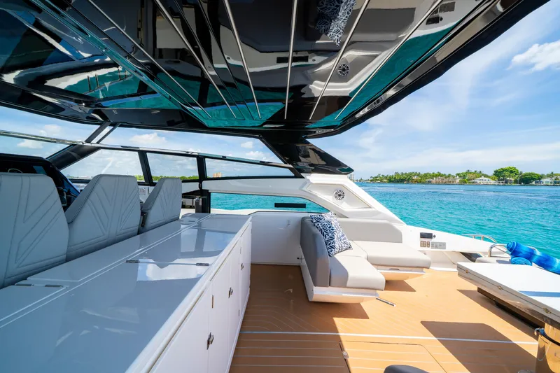  Yacht Photos Pics Luxurious 2024 Sunseeker Superhawk 55 yacht interior with sleek design and ocean view.
