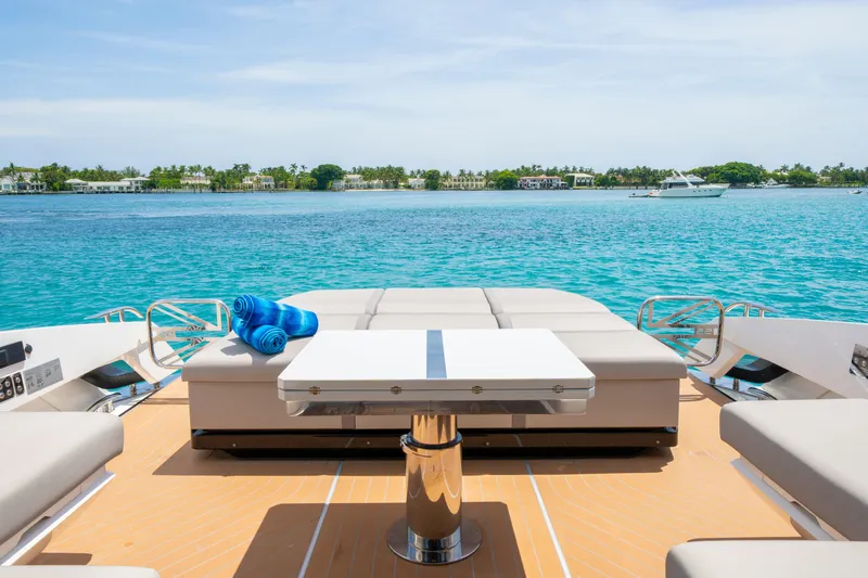  Yacht Photos Pics 2024 Sunseeker Superhawk 55 yacht deck with luxurious seating and ocean view.