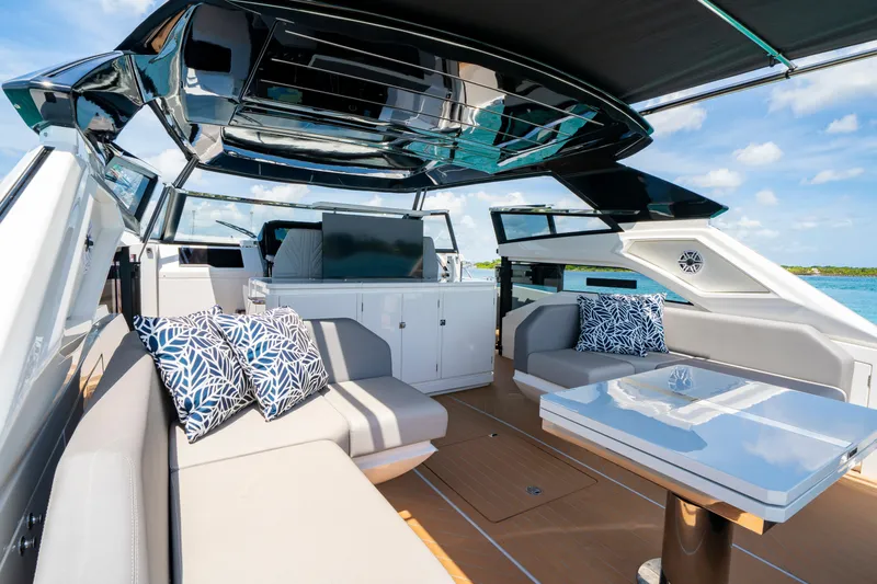  Yacht Photos Pics Luxurious 2024 Sunseeker Superhawk 55 yacht interior with elegant seating and modern design.