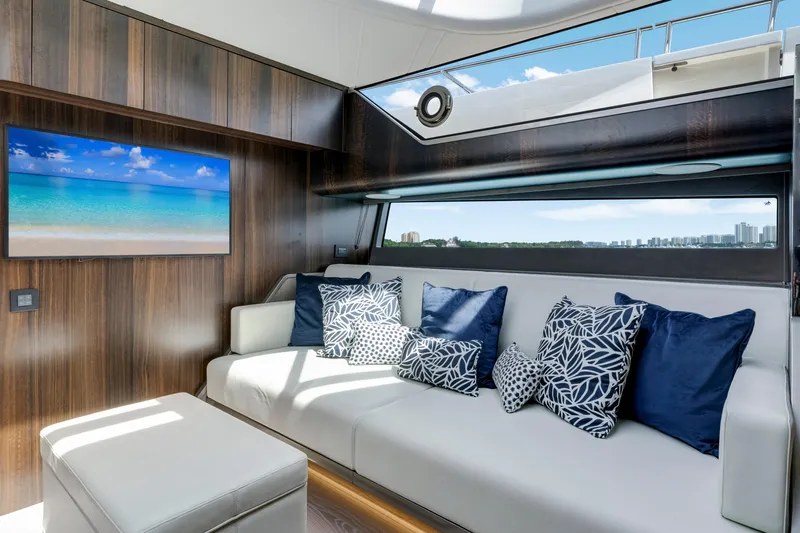  Yacht Photos Pics Luxurious interior of 2024 Sunseeker Superhawk 55 yacht with elegant seating and scenic views.