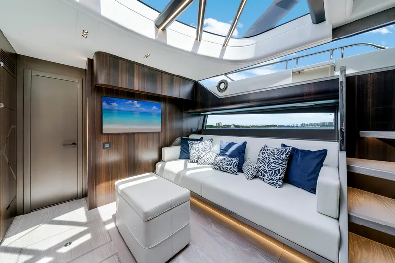  Yacht Photos Pics Luxurious interior of 2024 Sunseeker Superhawk 55 yacht with modern design and plush seating.